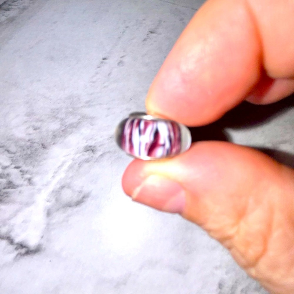 Pandora glass charm. Purplish colors with logo on side